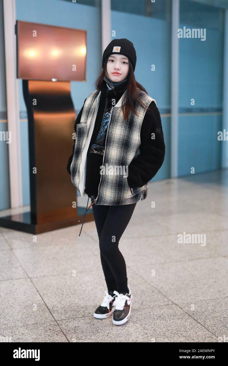 Jelly Lin or Lin Yun arrives at a Beijing airport before departure in Beijing, China, 29 November 2019.   Hat: Carhartt Stock Photo