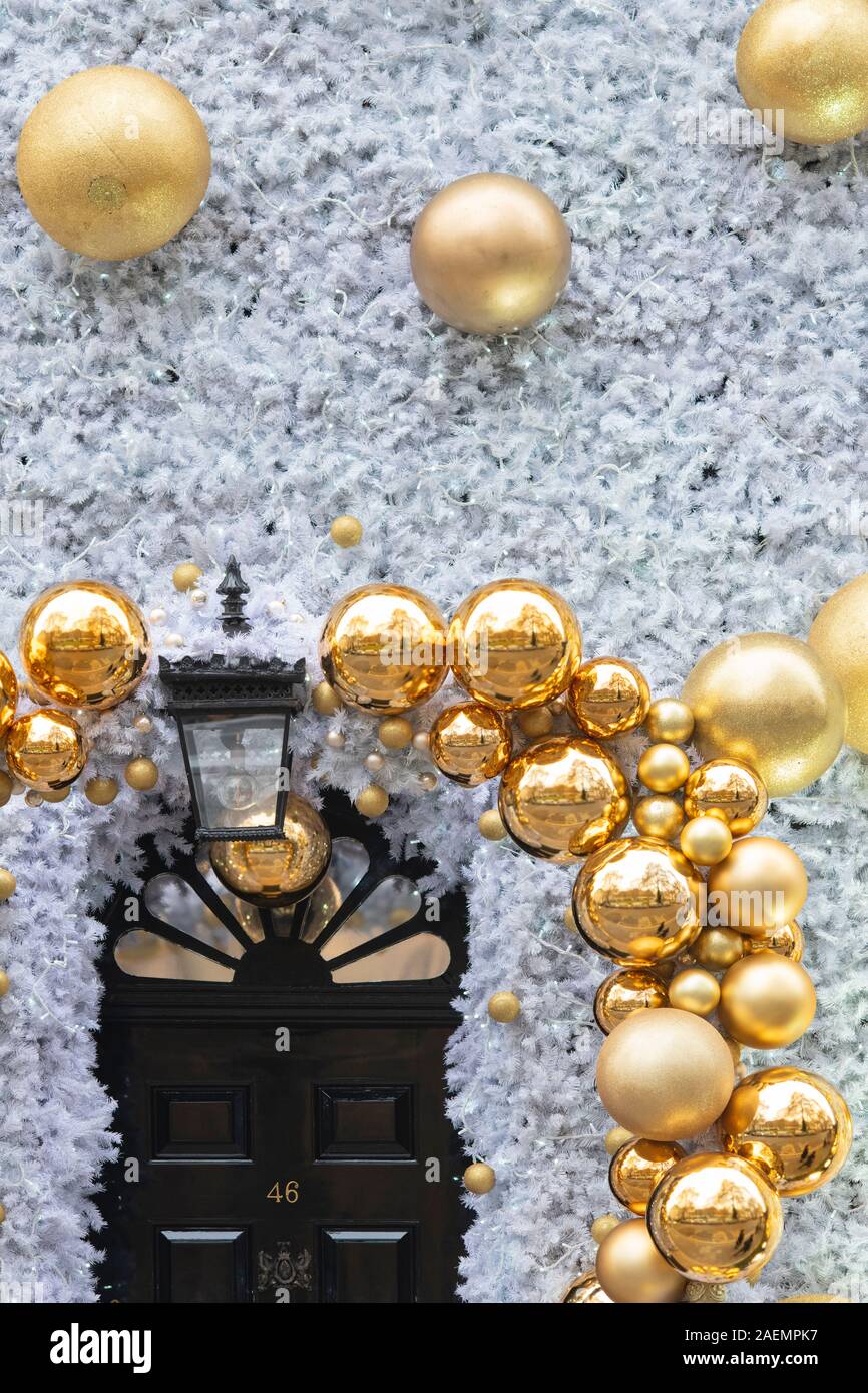Christmas decorations on the exterior of Annabels Private Club. Berkeley Square, Mayfair, London, England Stock Photo