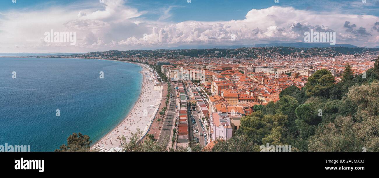 Panorama photo of the public baths Plage de Castel and Plage des Ponchettes in the city of Nice with the well known promenade quai des etats Unis alon Stock Photo