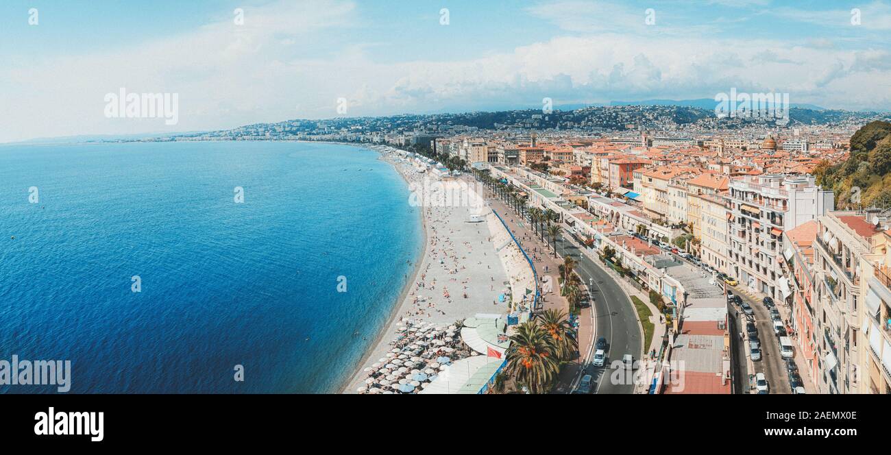 Panorama photo of the public baths Plage de Castel and Plage des Ponchettes in the city of Nice with the well known promenade quai des etats Unis alon Stock Photo