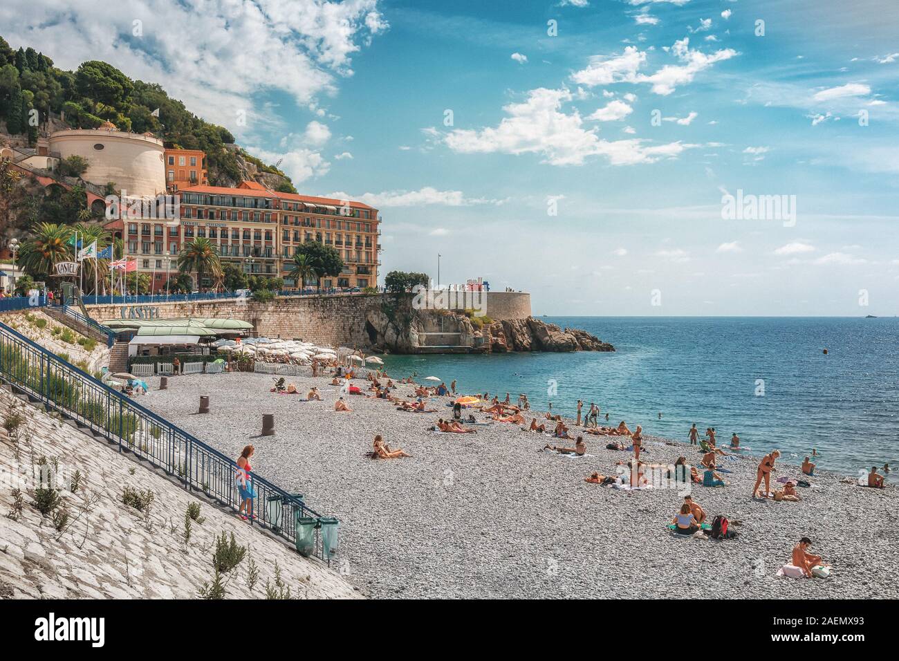 Nice, France, September 6, 2018: The public bath Plage de Castel with the Hotel Suisse in the background in the French city of Nice Stock Photo