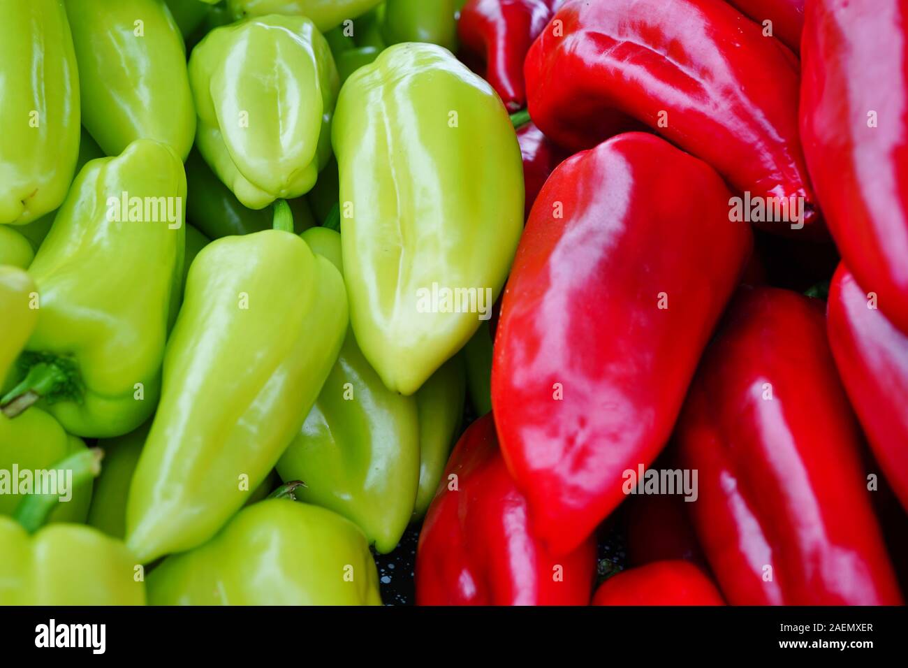 Colorful red and green peppers at a farmers market Stock Photo - Alamy