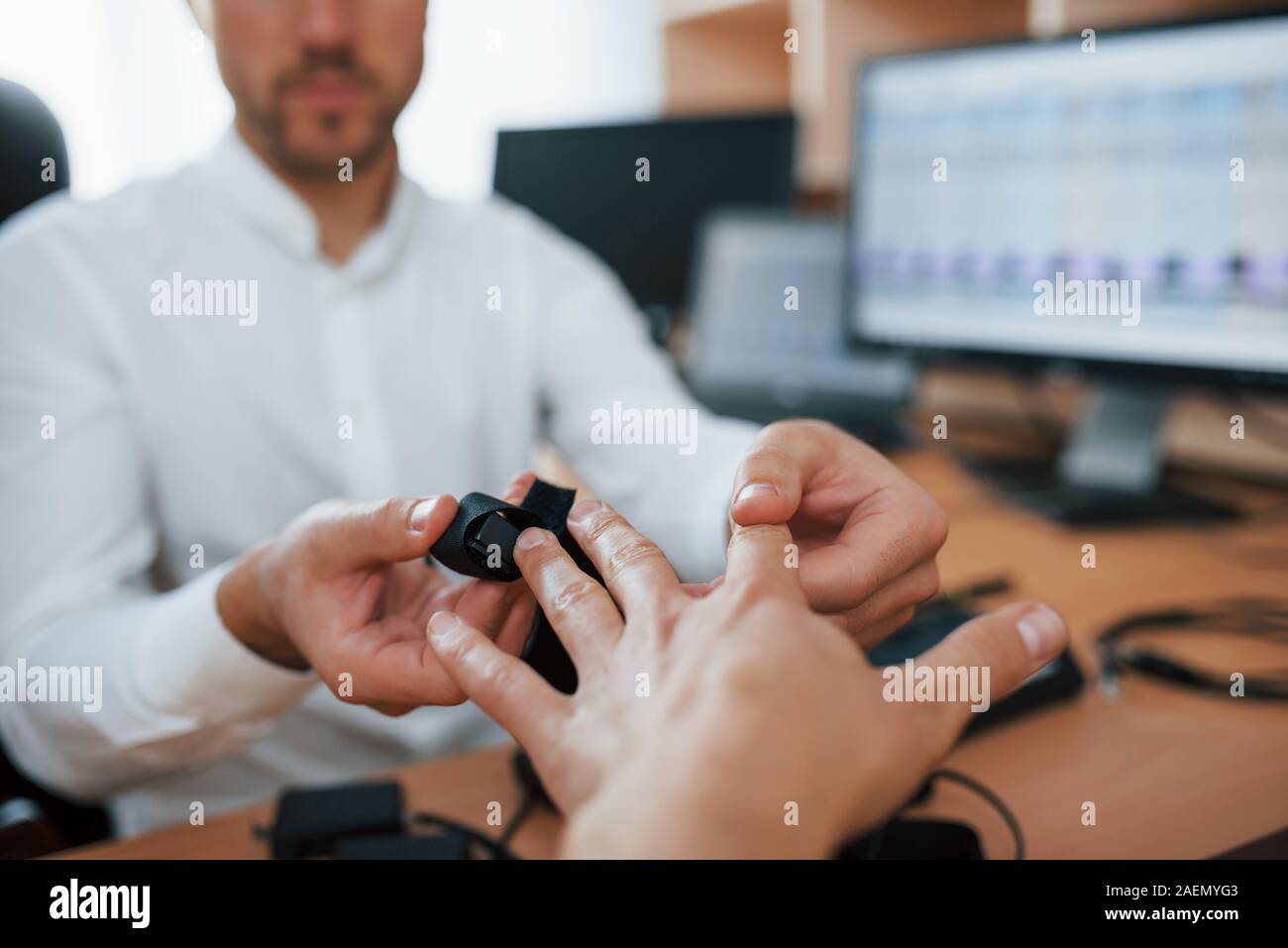 Preparation for the polygraph test. Conception of the lie detector Stock Photo