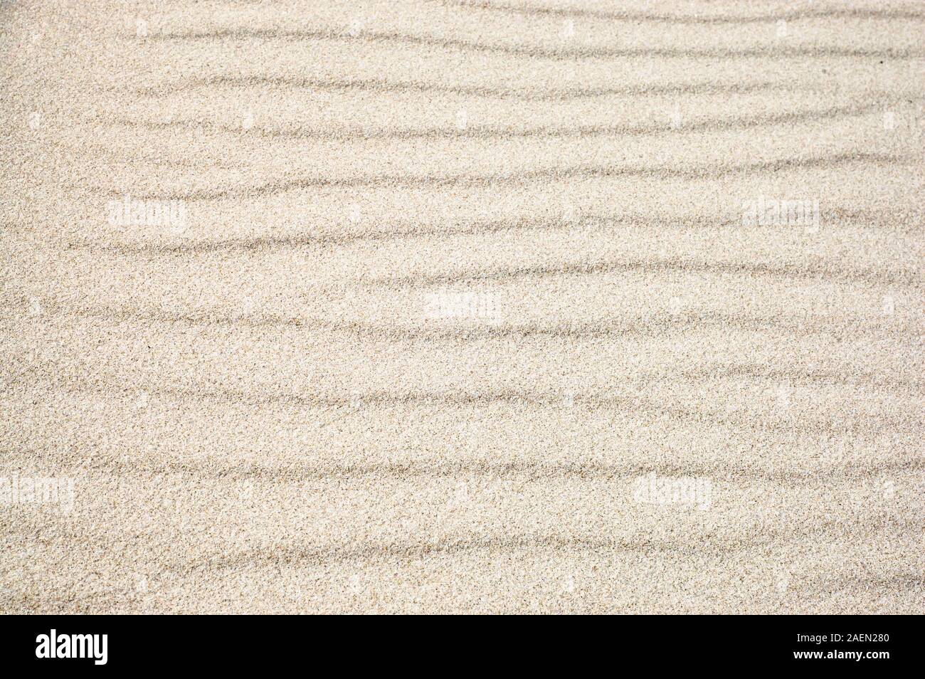 Background of sand, texture, sandy waves on the beach, pattern in ...