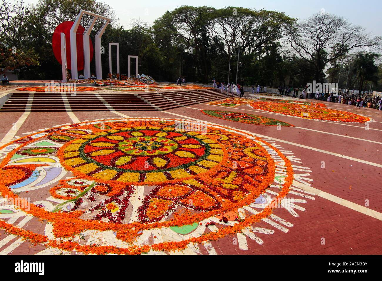 Central Shahid Minar with wreaths and flowers as the nation pays homage to the Language Movement martyrs on 21st February. Dhaka, Bangladesh. Stock Photo