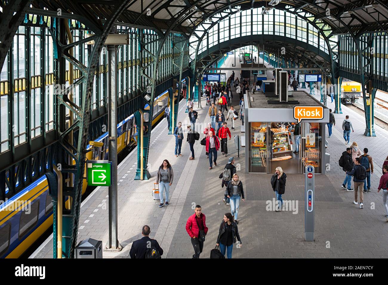 Railway station with passengers waiting for a train at platform. den Bosch  Netherlands Stock Photo - Alamy