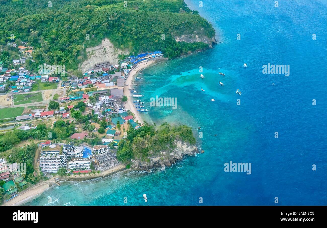 Aerial view of a popular beach and scuba diving resort area in the Sabang area of Puerto Galera, Philippines. Stock Photo