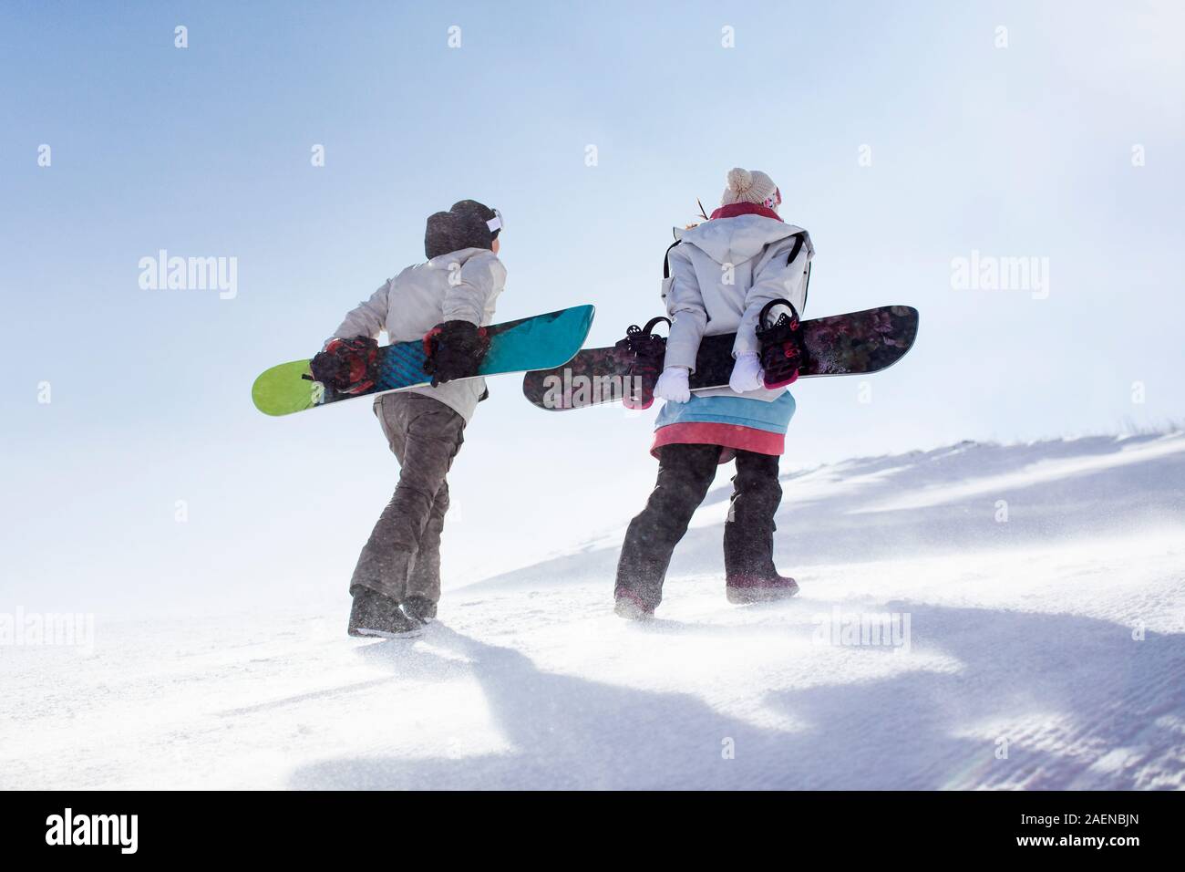 Young couple walking in ski resort Stock Photo