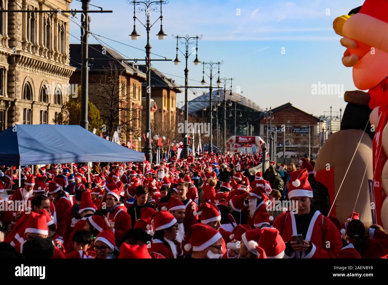 Budapest, Hungary - December 8, 2019: Participants in Santa Clause costumes at the finishing line of the 7th Santa Claus Charity Run of Budapest, capital of Hungary. Stock Photo
