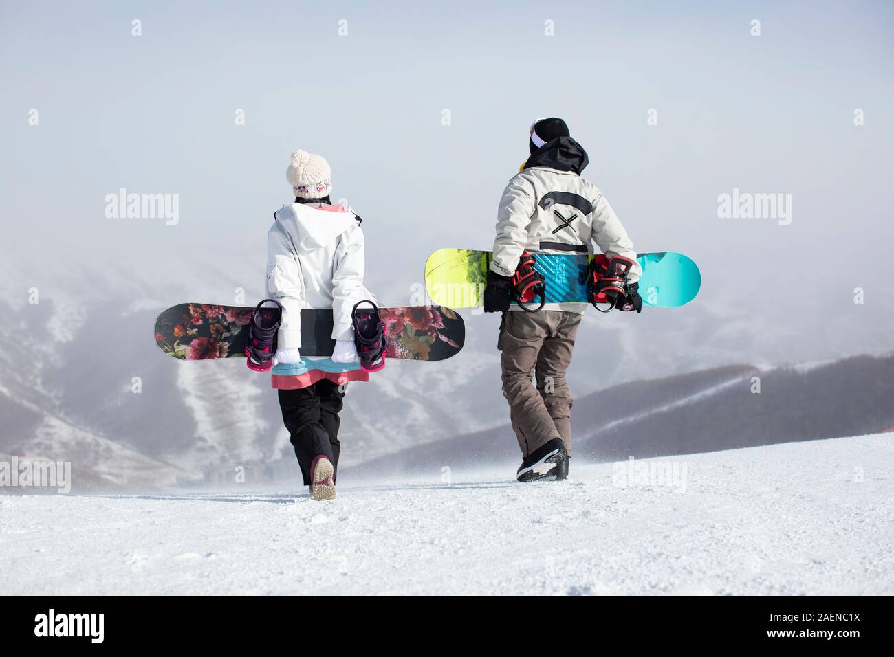Young couple walking in ski resort Stock Photo