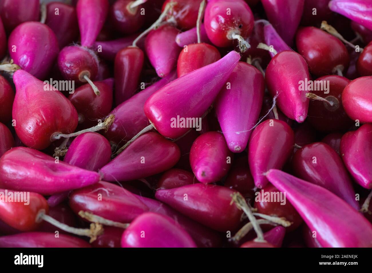 Pitiguey pink fruits assortment lot marketplace. Stock Photo