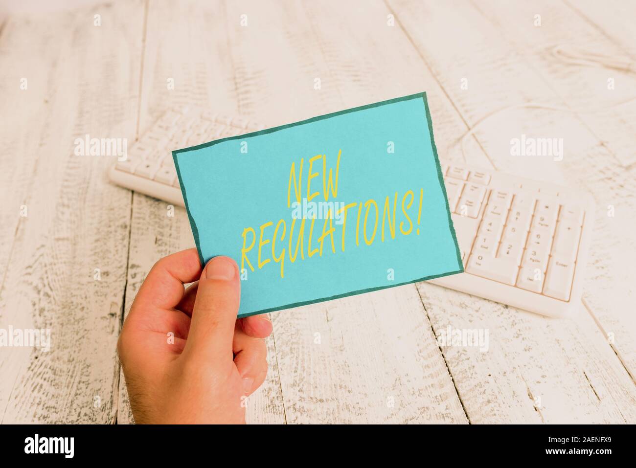 Writing note showing New Regulations. Business concept for rules made ...