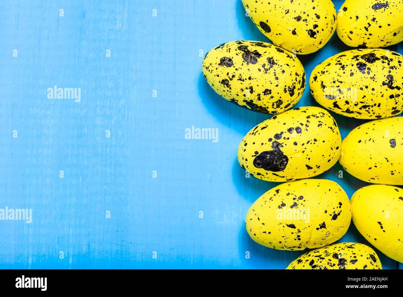Background with easter eggs on wooden board Stock Photo - Alamy