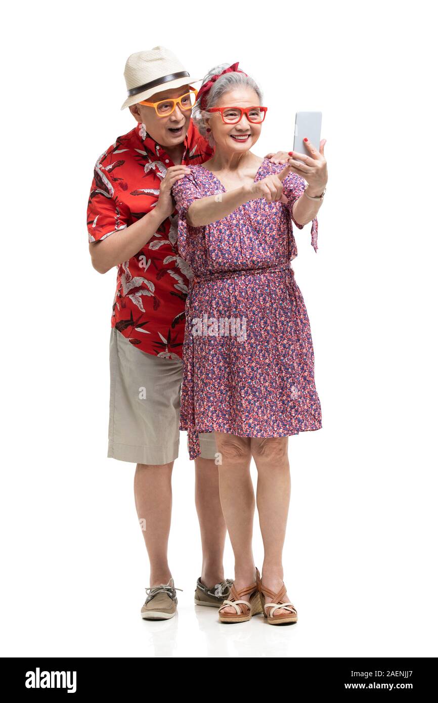 Happy senior couple taking selfie Stock Photo