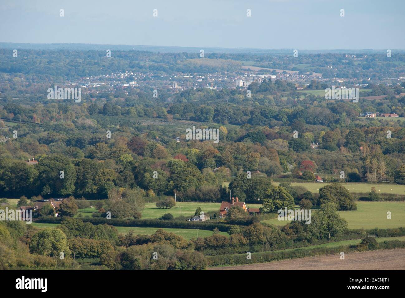 Houses, trees, fields, houses and buildings around Newbury and West Berkshire from the North Wessex Downs on a fine autumn day, October Stock Photo