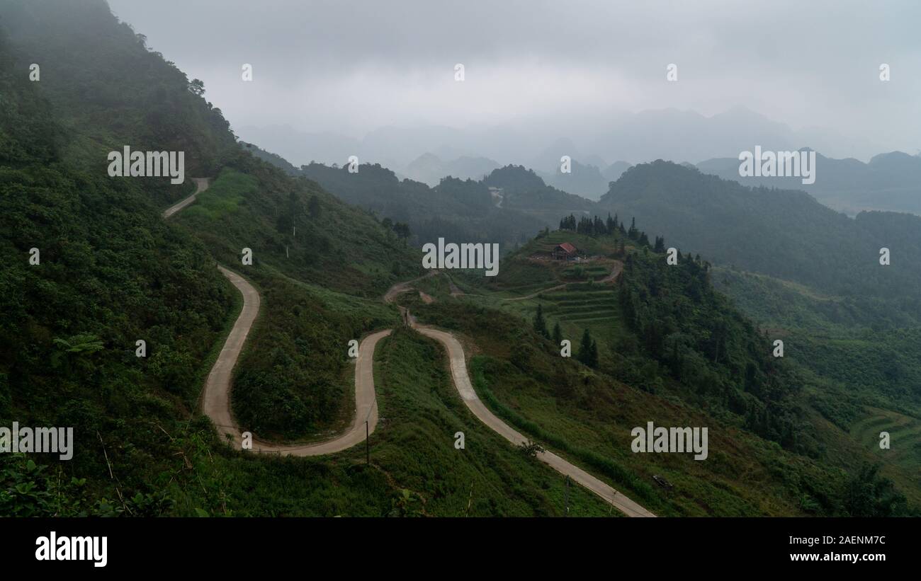 Overlooking Heaven Gate in Quan Ba. Ha Giang Loop is a popular motorcycle loop in Northern Vietnam known for winding roads and dramatic landscapes Stock Photo