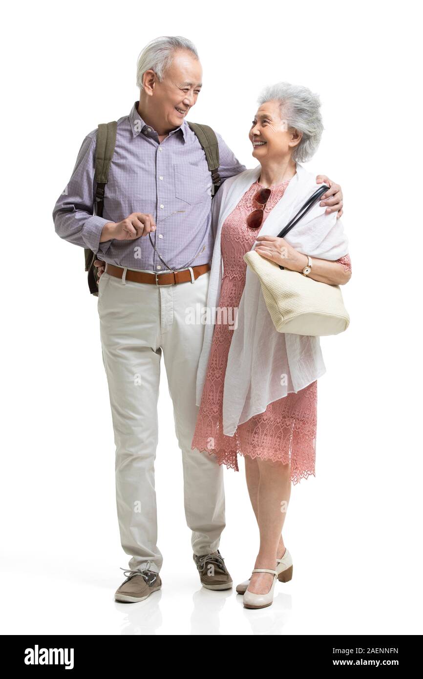 Back view couple walking arm hi-res stock photography and images - Alamy