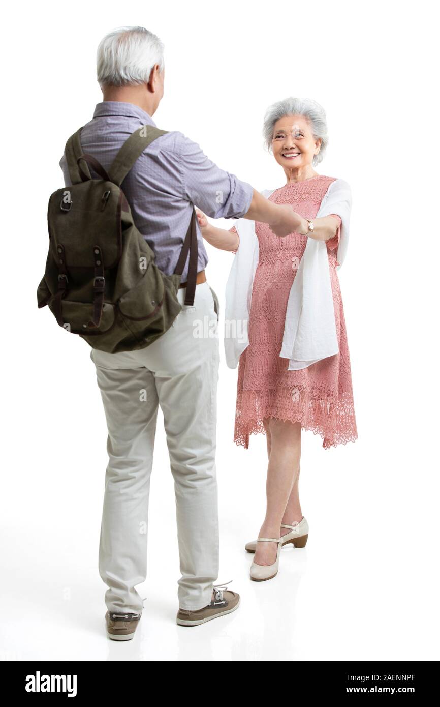 Happy senior couple holding hands Stock Photo