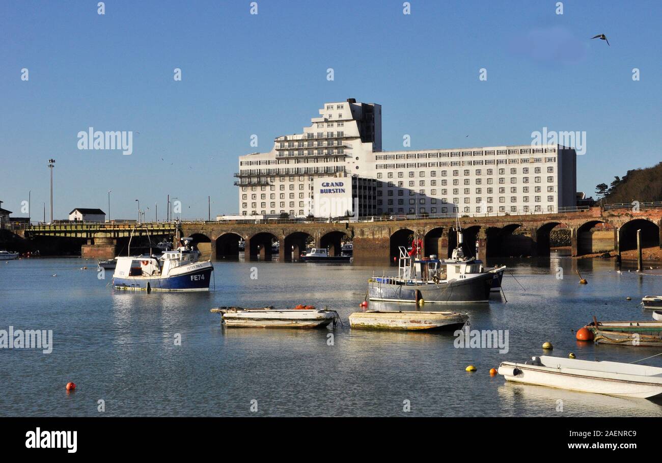 Folkestone harbour with fishing boats ,tides in.Hotel looks like an ocean liner.Kent UK Stock Photo