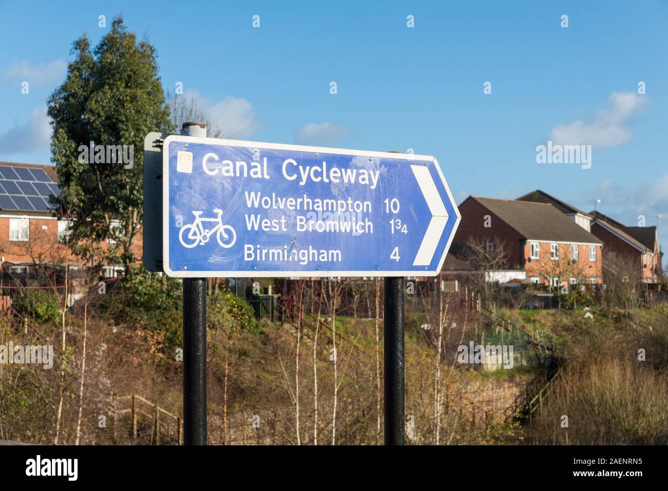 Canal cycleway direction sign for cyclists on the Old Main Line Canal in Smethwick,West Midlands,distance to Birmingham and Wolverhampton. Stock Photo