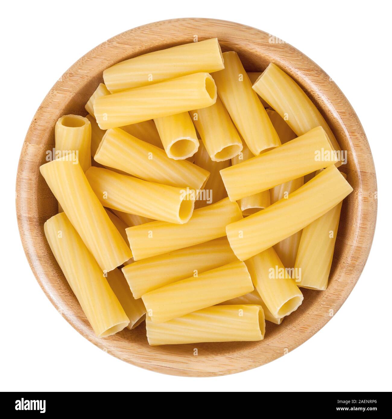 Rigatoni pasta in wooden bowl isolated on white background Stock Photo
