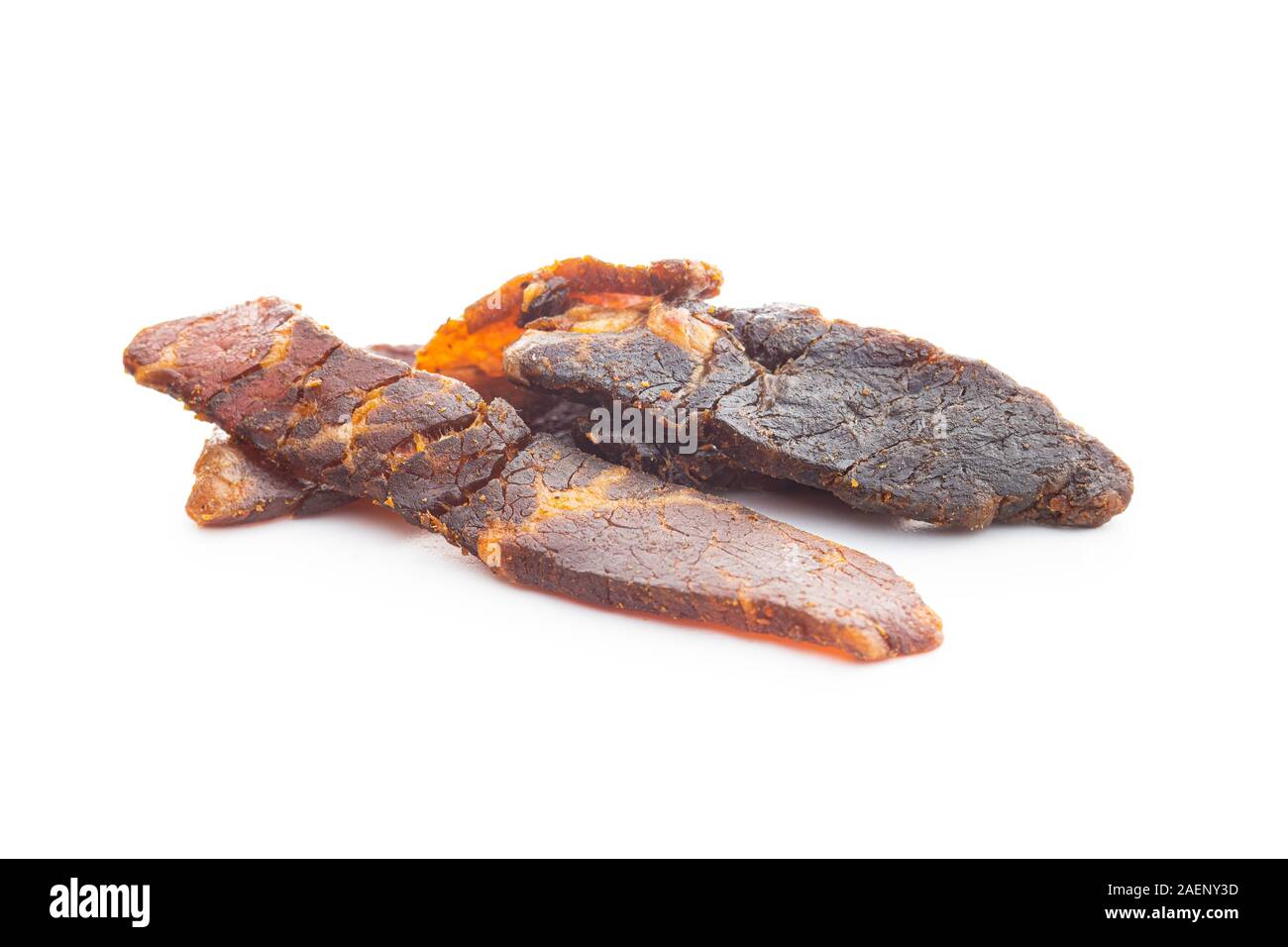 Beef jerky pieces. Dried beef meat isolated on white background Stock ...