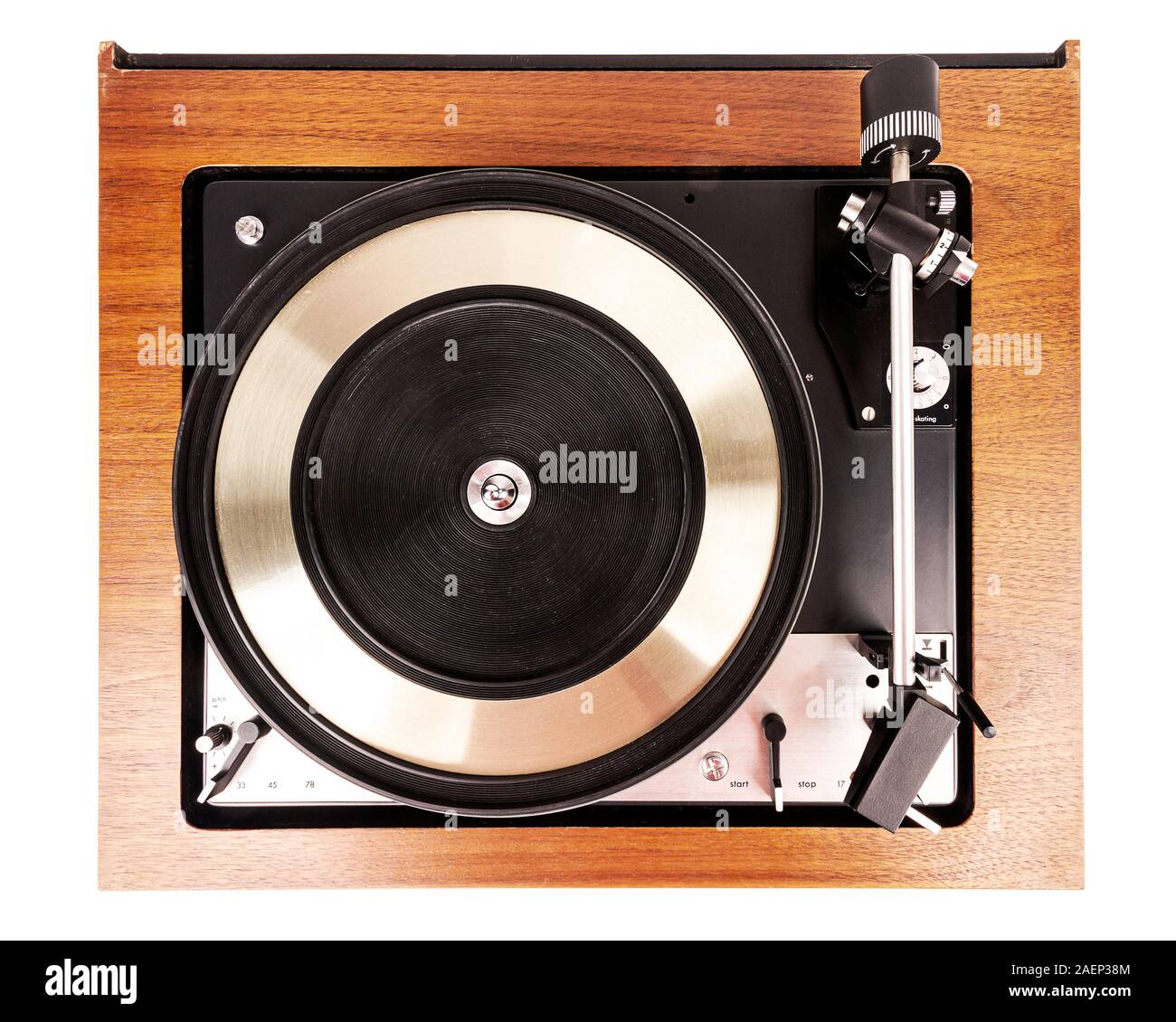 Vintage turntable vinyl record player isolated on white. Wooden plinth