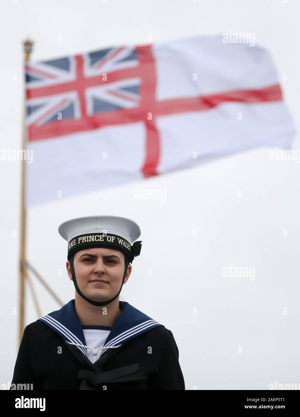 Able Writer McKenna Shepherd-Ford who helped raise the White Ensign on the stern of the Royal Navy aircraft carrier, HMS Prince of Wales, during her commissioning ceremony at Portsmouth Naval Base. Stock Photo