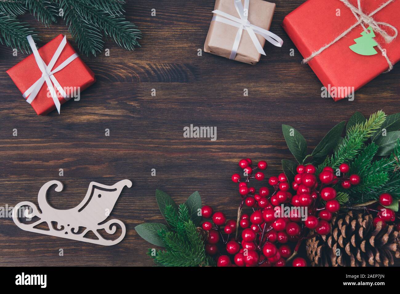 Top above high angle closeup overhead view photo of nice beautiful christmas decoration lying on wooden dark table desk Stock Photo