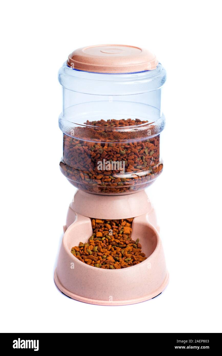 Pet Dry Food Storage Meal Feeder Dispenser or pet food dispenser on a white background Stock