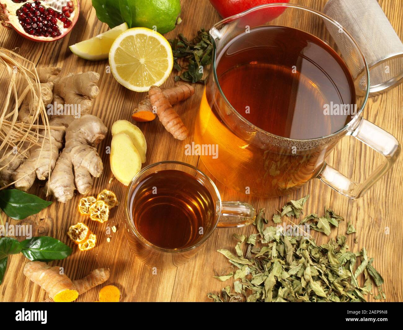 Tea with different ingredients on wooden Background Stock Photo