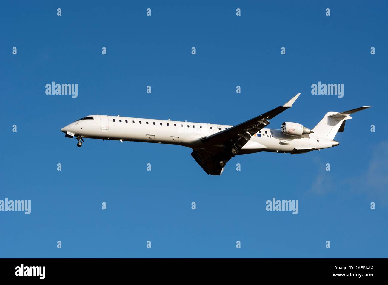 Cityjet Bombardier CRJ-900LR landing at Birmingham Airport, UK (EI-GEH) Stock Photo