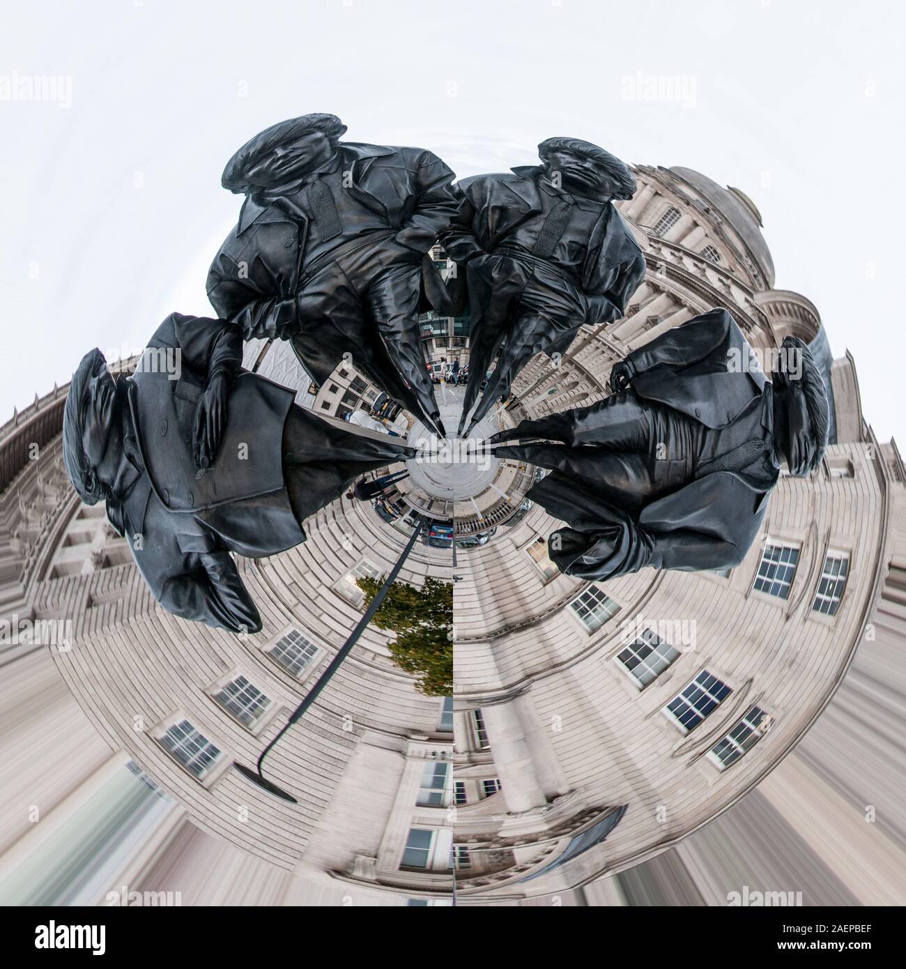 Little Planet Effect - The Beatles statue, found in front of the Port of Liverpool Building, on Liverpool waterfront. With a twist! Stock Photo