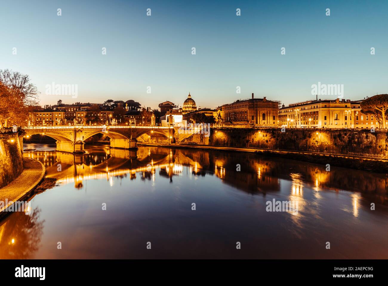 St Peters basilica and river Tibra at night in Rome, Italy Stock Photo