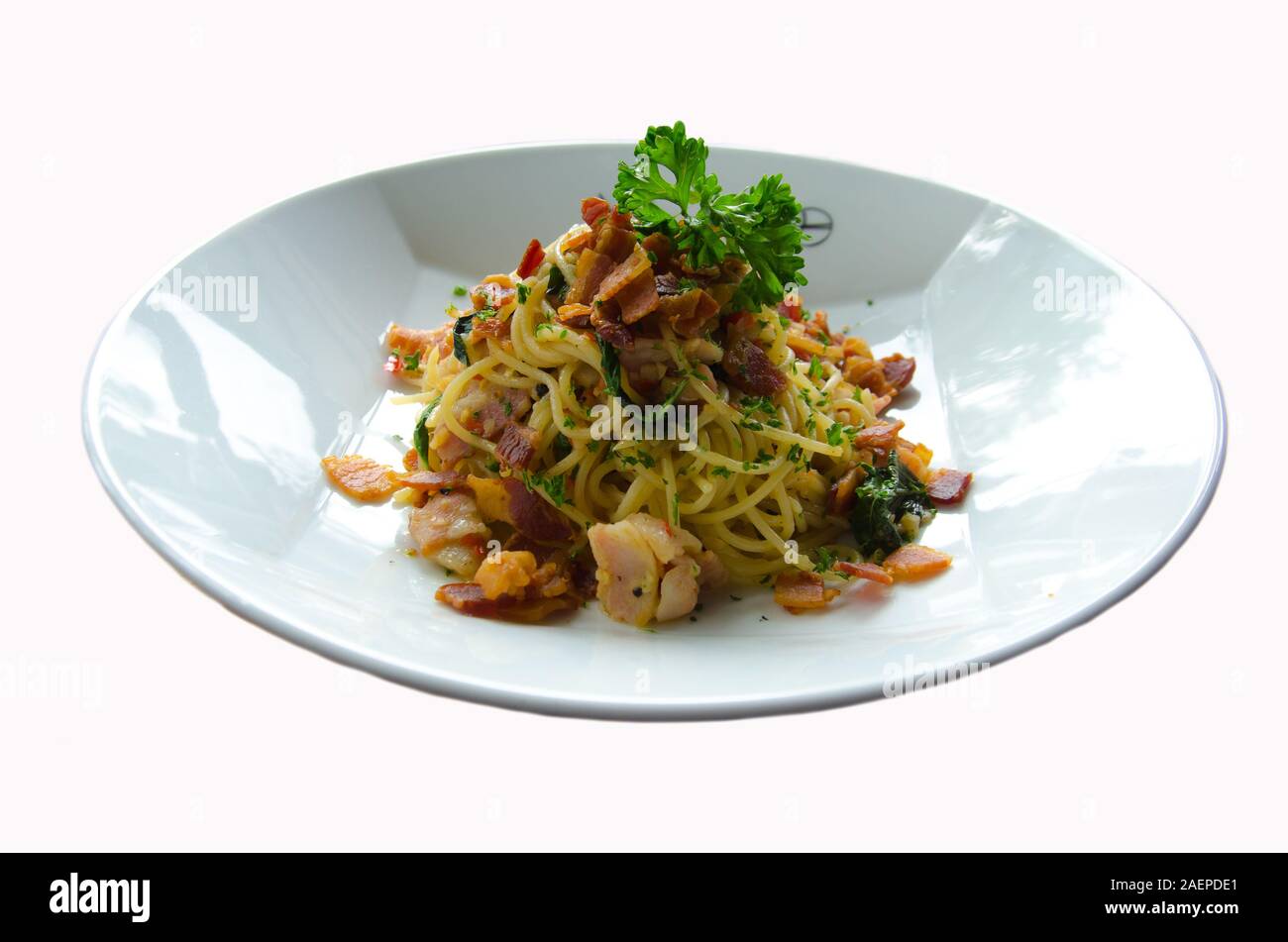 spicy spaghetti with ham for meal on white background Stock Photo