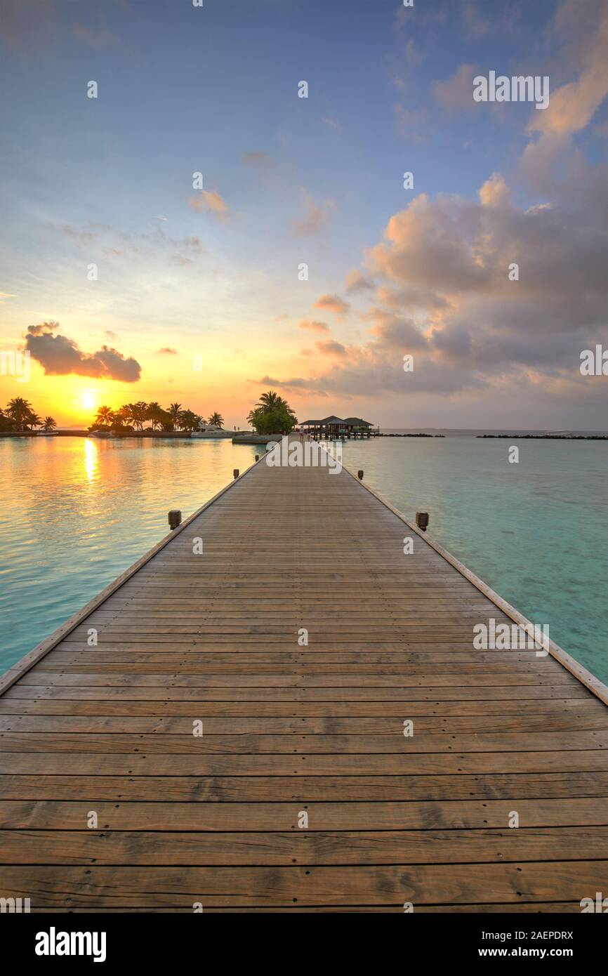 Footbridge of Paradise Island (Lankanfinolhu) at sunset, Maldives Stock Photo