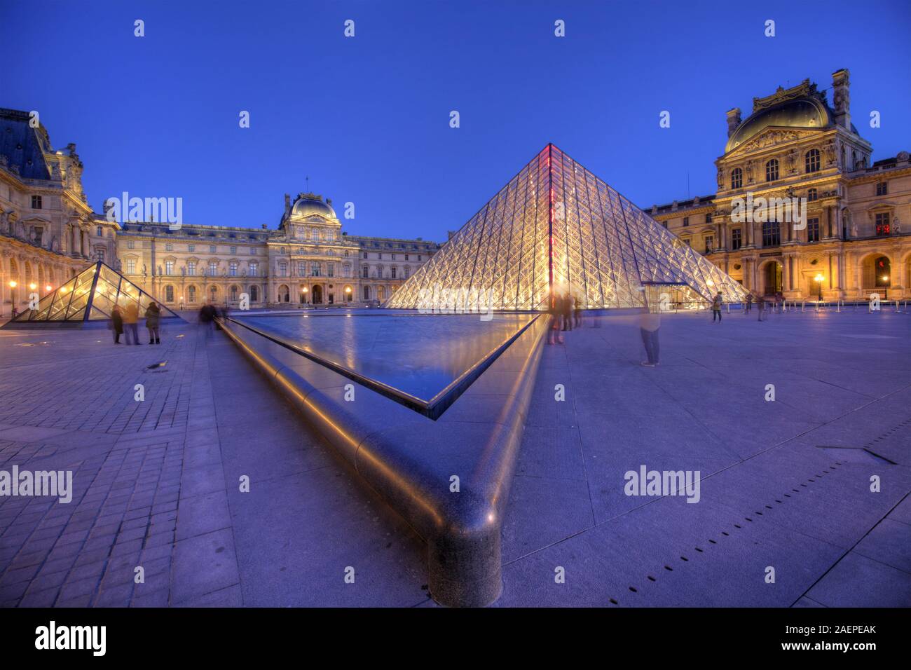 The Louvre Pyramid and Palace, Paris, France Stock Photo