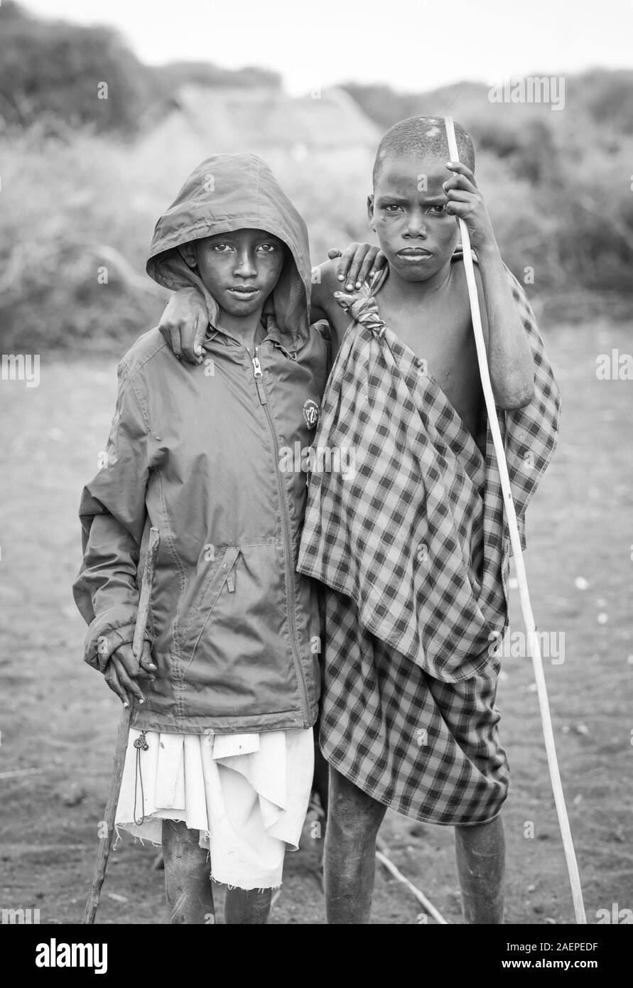 Same, Tanzania, 7th June 2019: maasai boys in their home boma Stock Photo