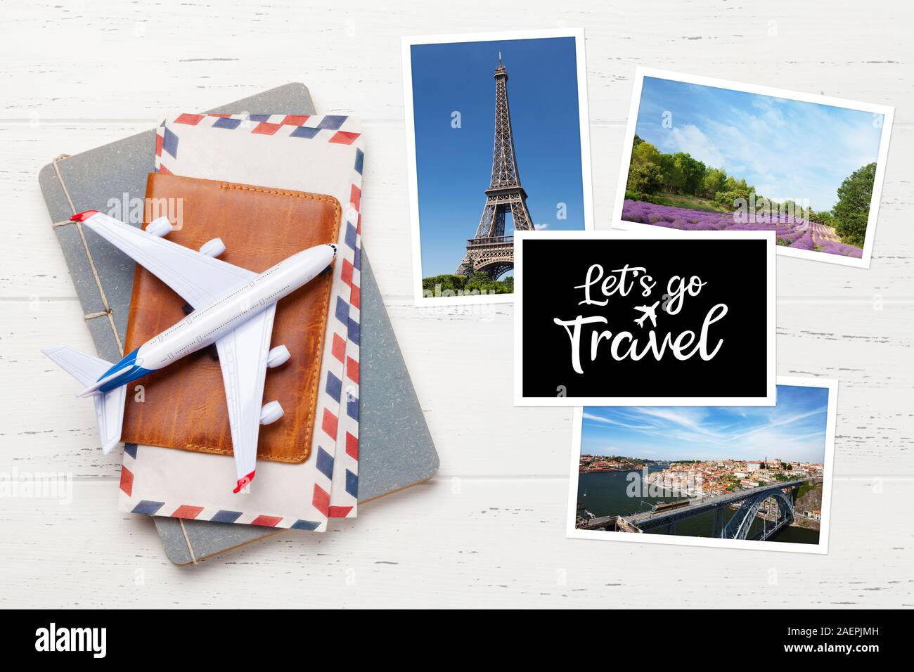 Travel concept with vacation photos, airplane, passport and notepad. Top view flat lay with copy space Stock Photo