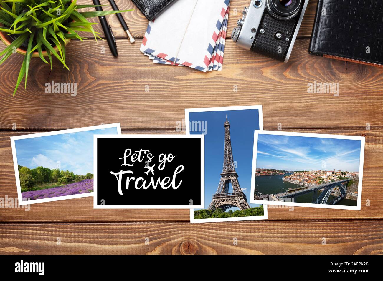 Travel concept with photos, camera and passport. Top view flat lay with copy space Stock Photo