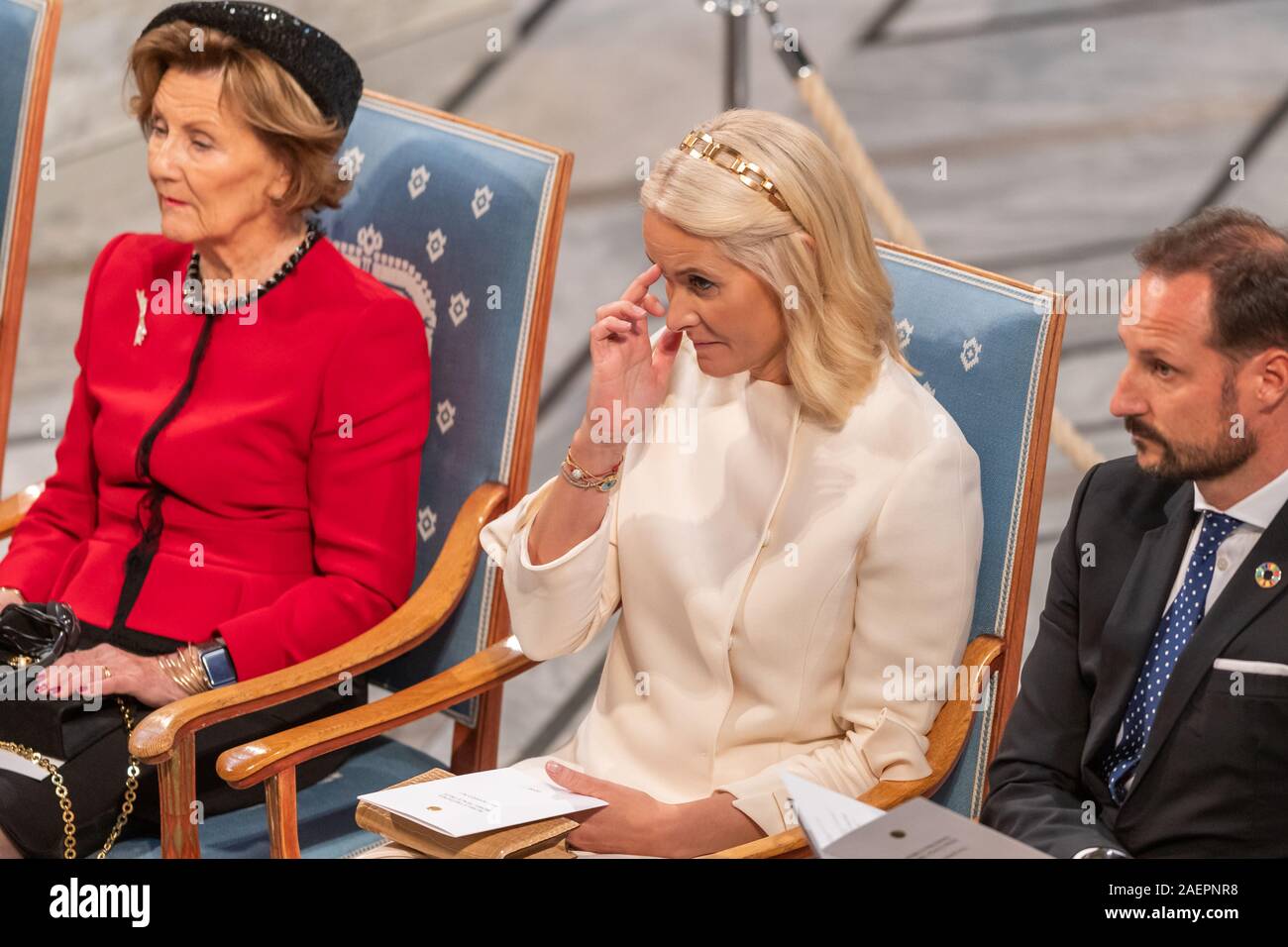 Oslo, Norway. 10th Dec 2019.  Her Royal Highness The Crown Princess Mette Marit of Norway listening attentively during the acceptance speech by laureate Abiy Ahamd Prime Minister of Ethiopia at the Nobel Peace Prize Ceremony at the Oslo City Hall in Oslo, Norway Credit: Nigel Waldron/Alamy Live News Stock Photo