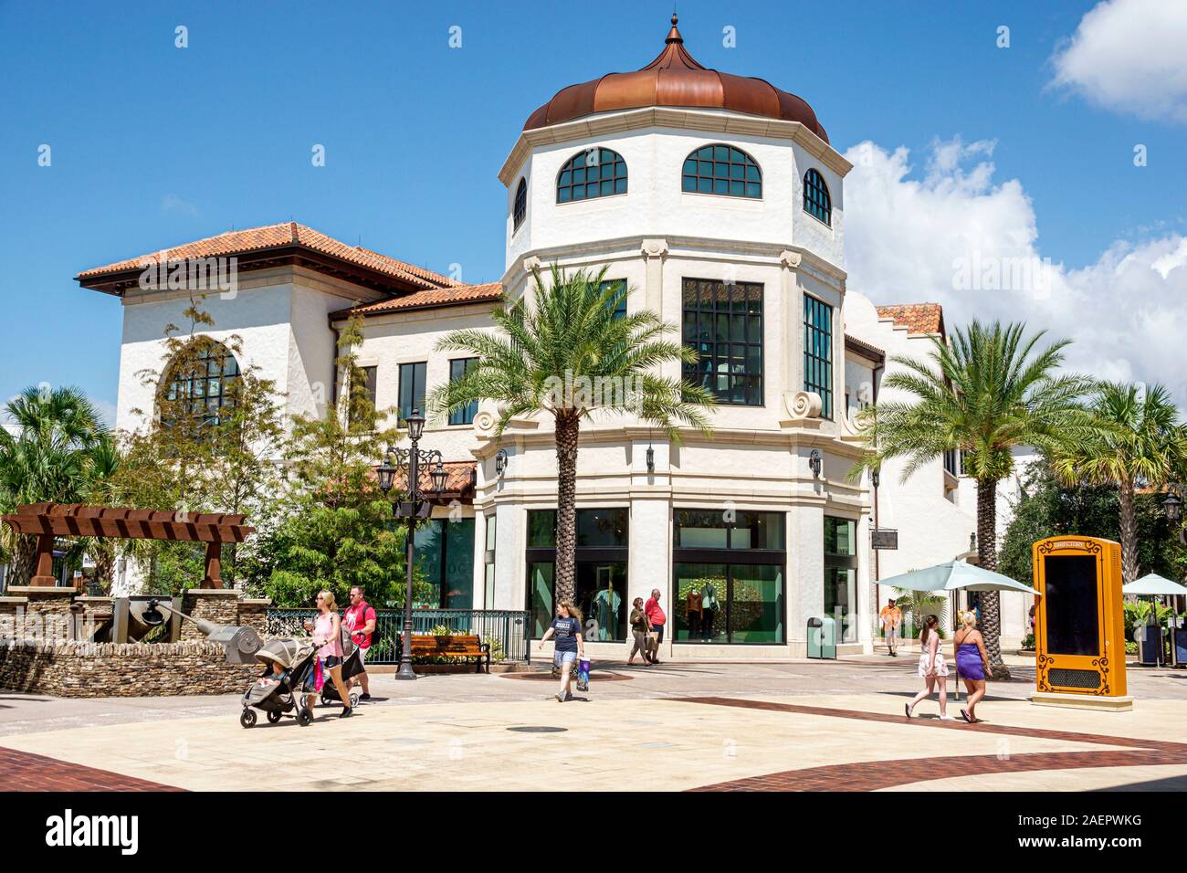 Orlando Florida Lake Buena Vista Downtown Disney Springs,outdoor shopping plaza mall,exterior,woman,man,family,FL190920129 Stock Photo