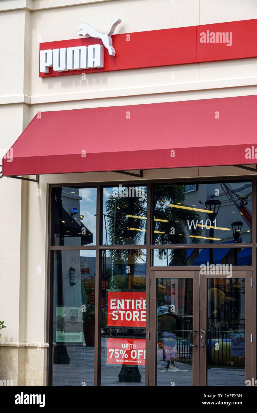 West Palm Beach Florida,Palm Beach Outlets,shopping,Puma,German athletic footwear shoes,store,exterior,sign,sale,entire store,front entrance,FL1909201 Stock Photo