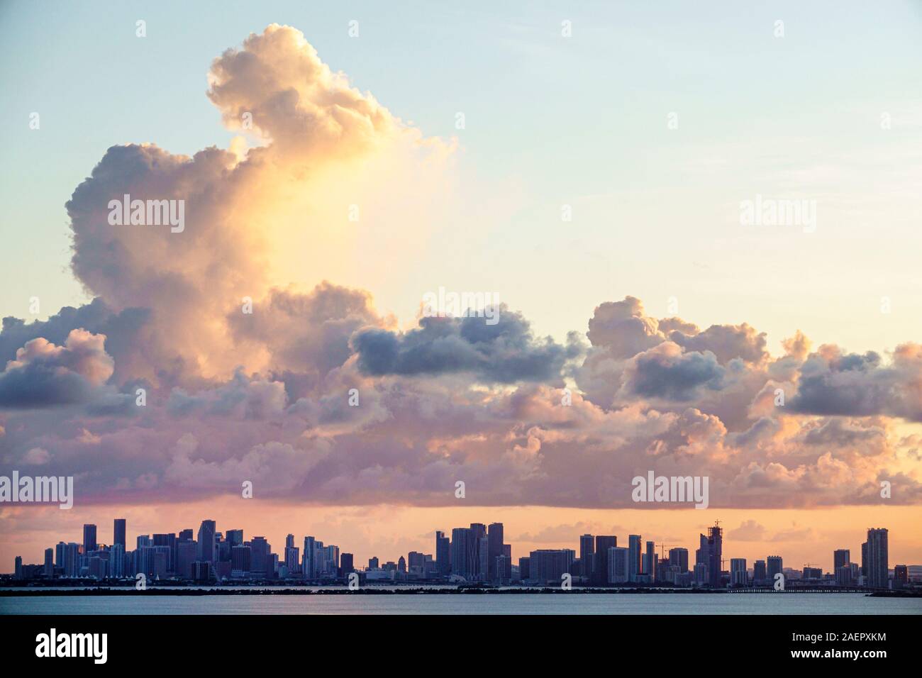 Miami Beach Florida,North Beach,Miami downtown city skyline,sunset,clouds,Biscayne Bay,aerial overhead view from above,FL191025021 Stock Photo