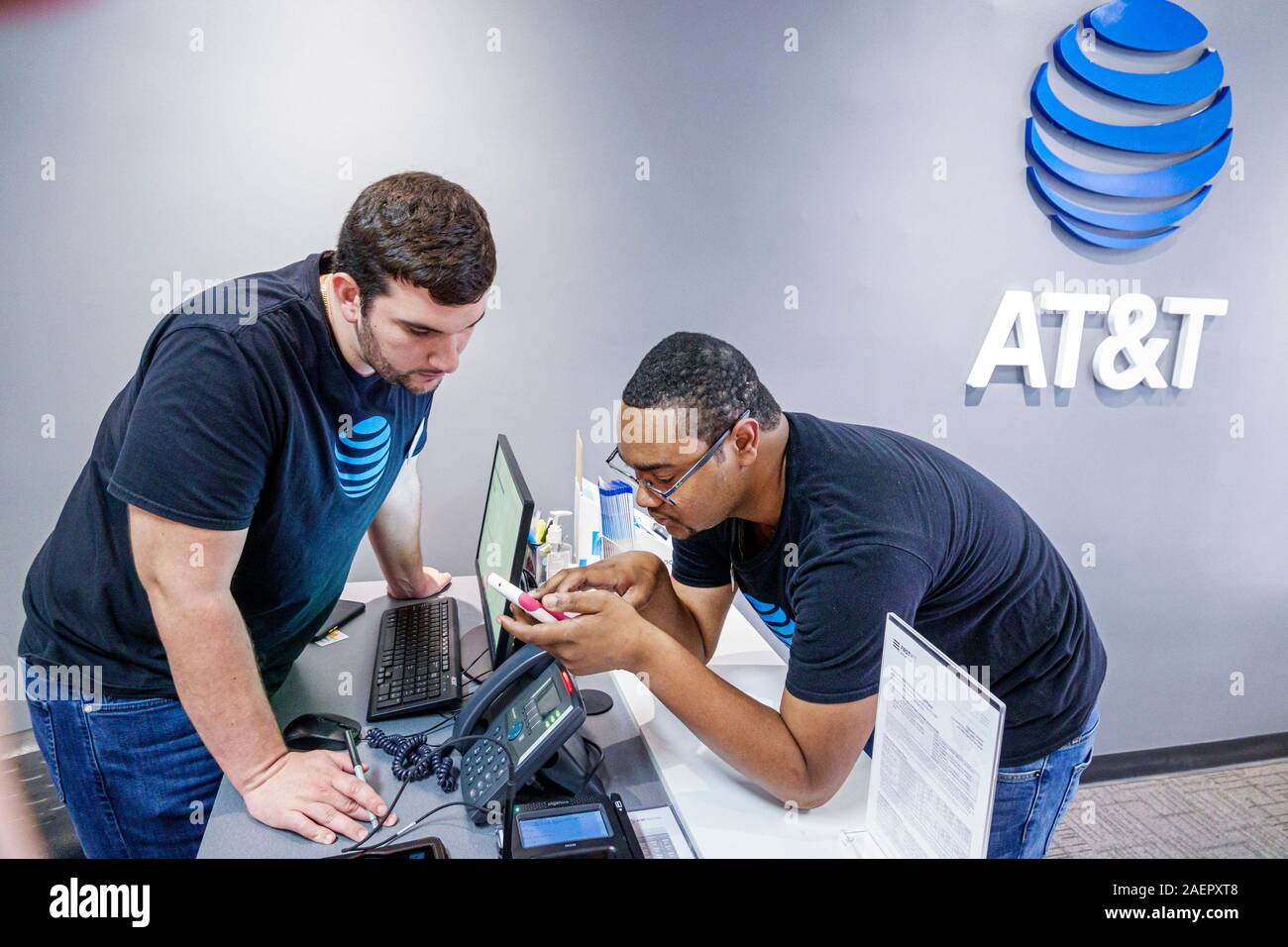 Miami Florida,Surfside,AT&T,store,telecommunications,technology,technician,employee employees worker workers working job jobs staff,Black Blacks Afric Stock Photo