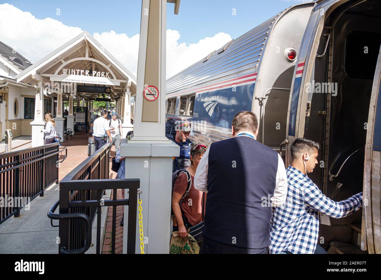 Orlando Winter Park Florida,Amtrak/Sunrail Amtrak Sunrail Station,train railway station,depot,platform,track,boarding,passengers riders,conductor,crew Stock Photo