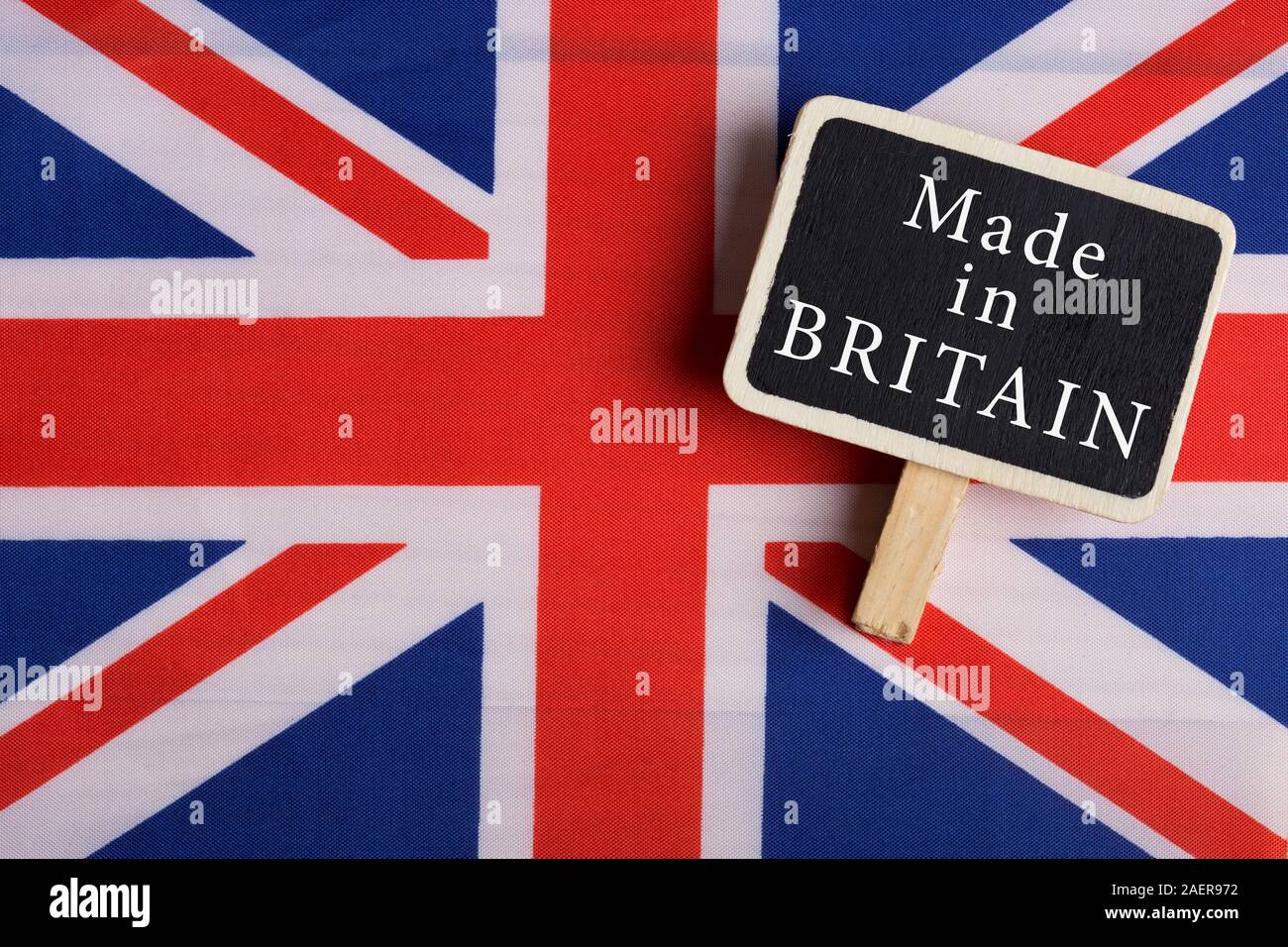goods and services concept - Great Britain country's flag, blackboard with text Made in Britain Stock Photo