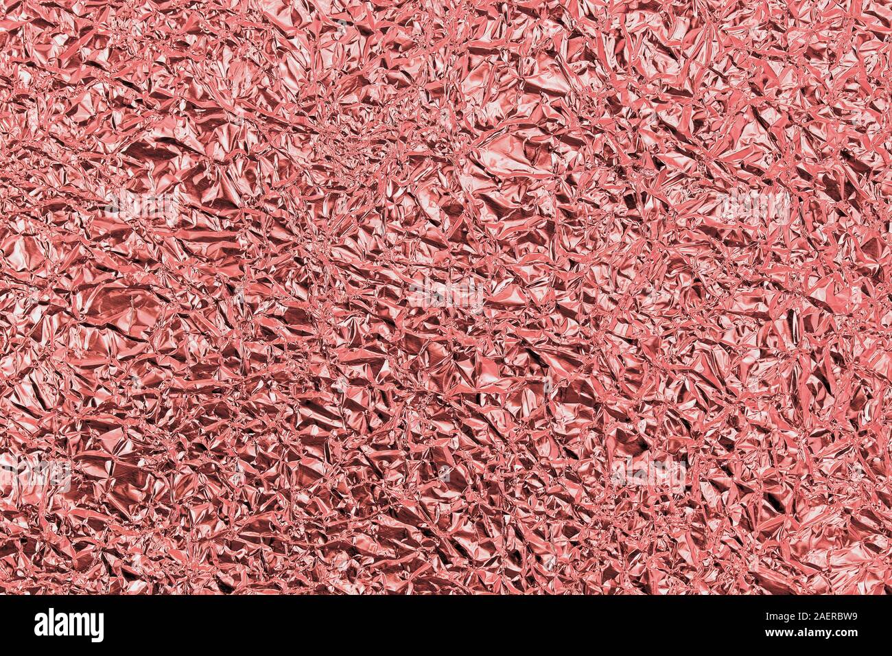 Red aluminum foil as a background Stock Photo Alamy