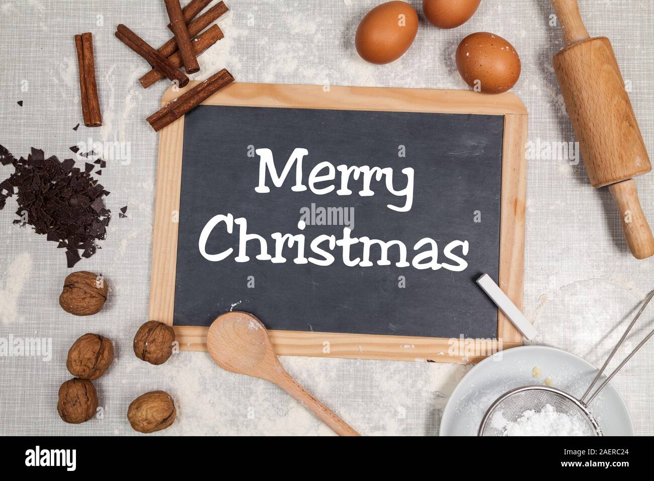Merry christmas written on blackboard Stock Photo