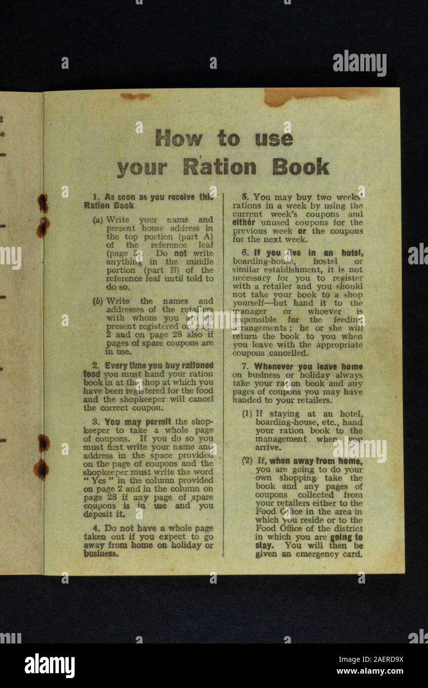 'How to use your Ration Book' inside a replica Ration Book from 1941, a piece of World War II related memorabilia from Britain in the 1940s. Stock Photo